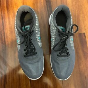 Women’s size 10 Nike Sneakers in Gray with Teal Highlights